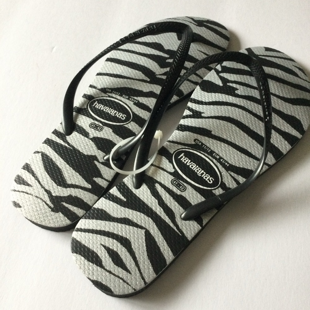 HAVAIANAS WOMENS SLIM ANIMAL ZEBRA FLIP FLOPS SILVER AND BLACK SIZE 11/12 NWOT
